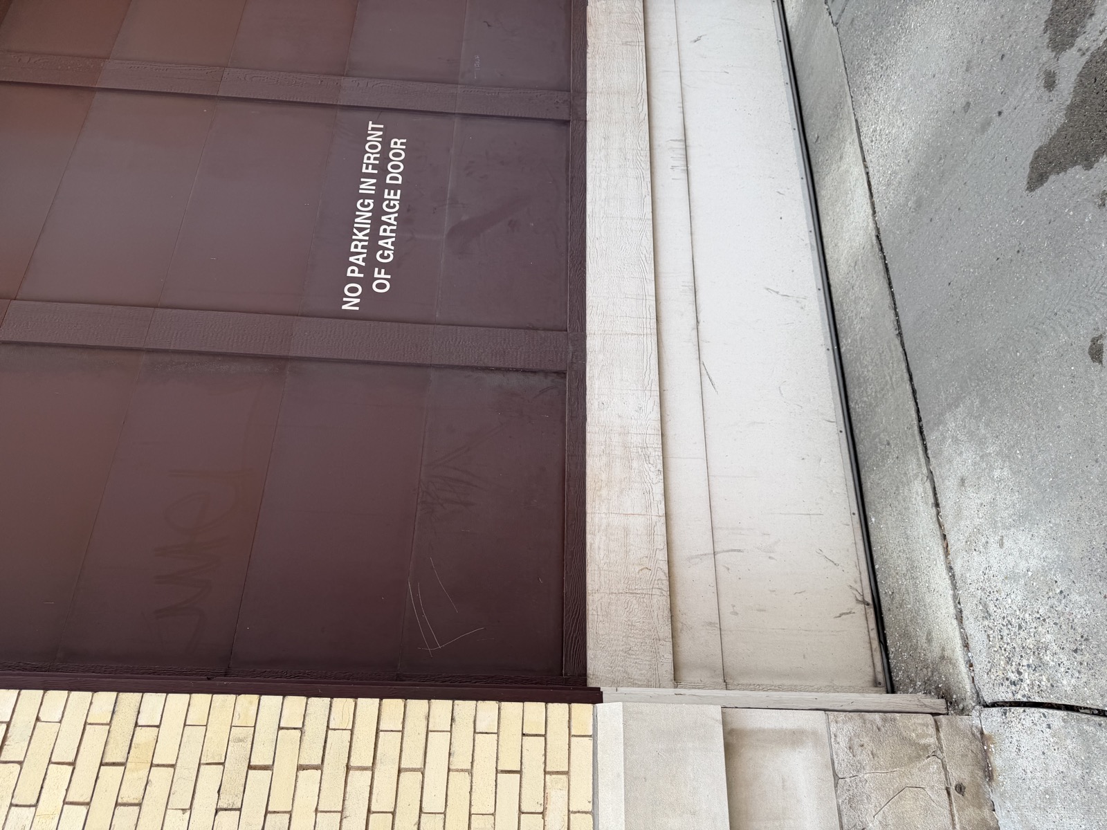 East Exterior - Garage Entry